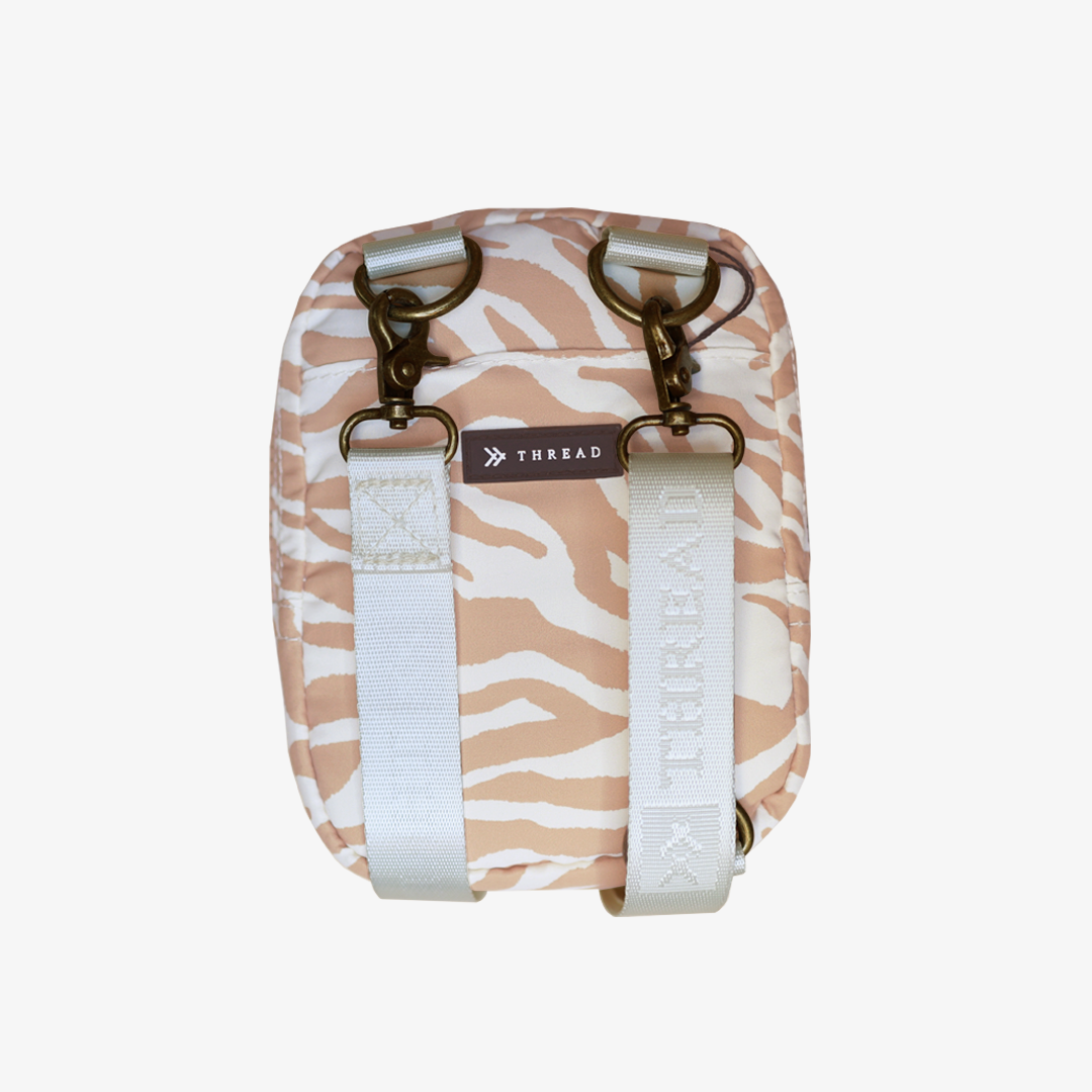 Back of the Thread¨ Mozi crossbody bag showing straps and zebra style print