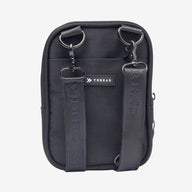 Inside of the Thread® Black crossbody bag showing pockets and printed lining