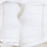 Inside of the Thread® Off White crossbody bag showing pockets and printed lining